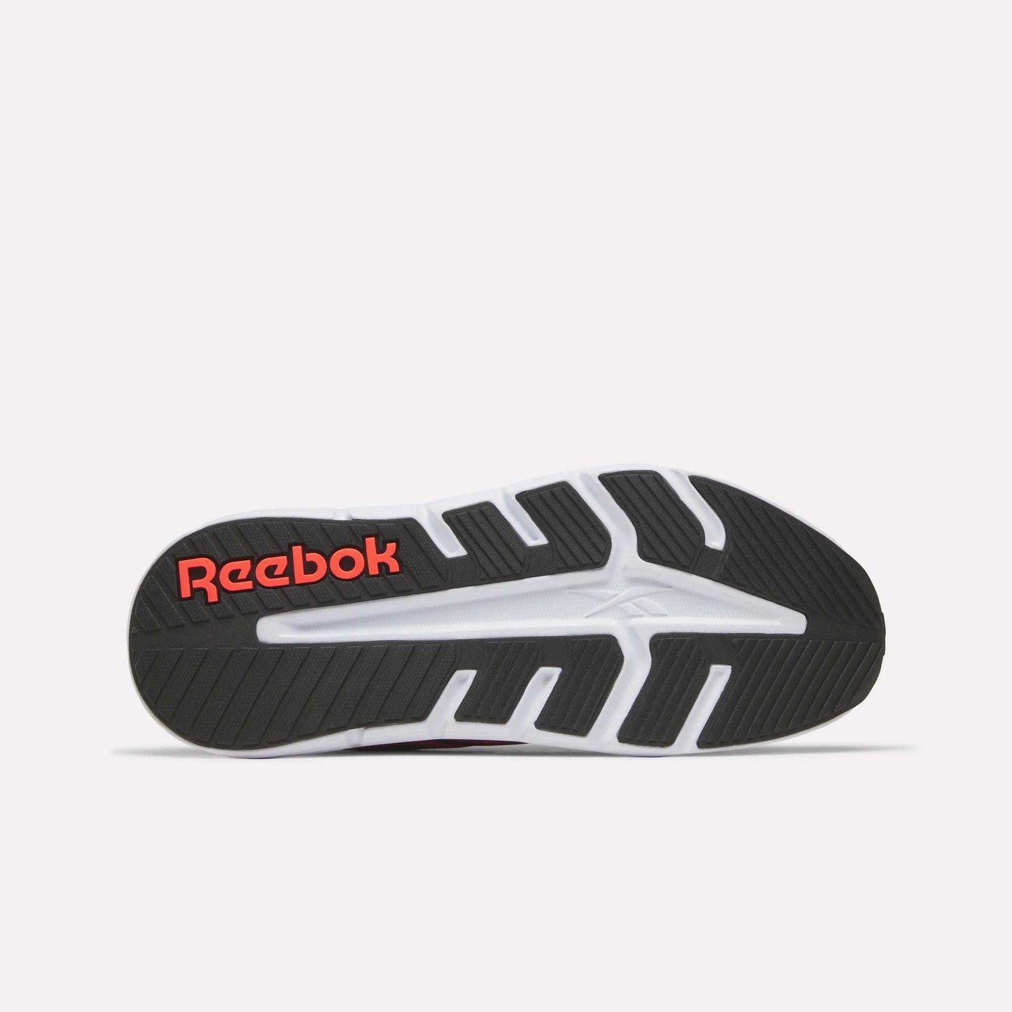 The image displays the sole of Reebok Nano Gym 2.0 Training Shoes, featuring a black and white tread pattern with the red Reebok logo near the heel.