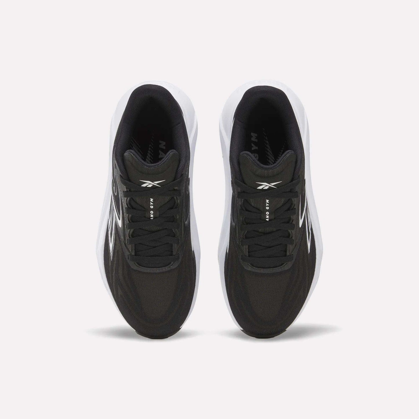 Top view of Women's Nano Gym 2.0 Training Shoes by Reebok, in black with white soles and subtle white branding on the tongue and sides, displayed against a plain white background.
