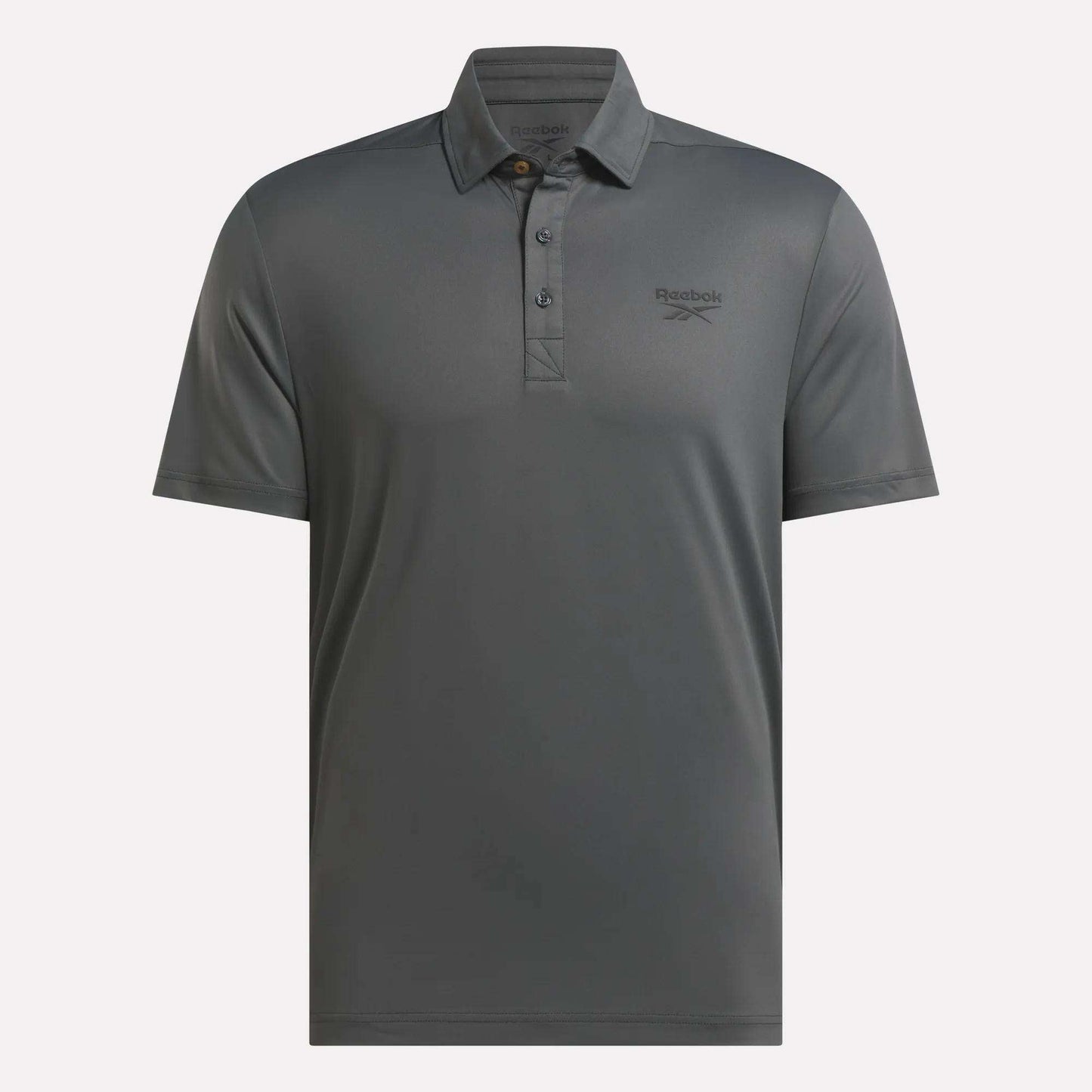 The Reebok Men's BDC Colorblocked Polo Shirt features a collar, three-button placket, subtle left-chest logo, and RBK-DRY tech for all-day comfort.