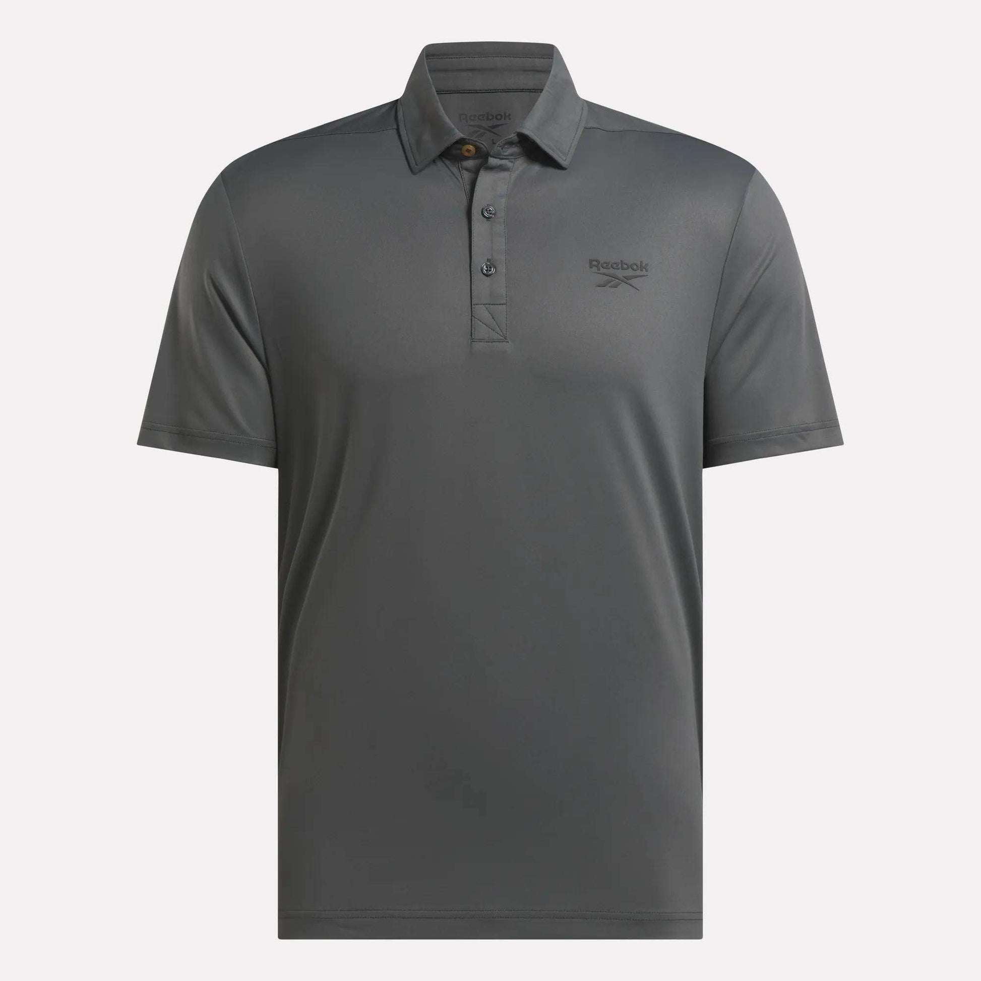 The Reebok Men's BDC Colorblocked Polo Shirt features a collar, three-button placket, subtle left-chest logo, and RBK-DRY tech for all-day comfort.