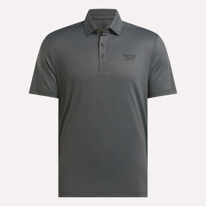 The Reebok Men's BDC Colorblocked Polo Shirt features a collar, three-button placket, subtle left-chest logo, and RBK-DRY tech for all-day comfort.