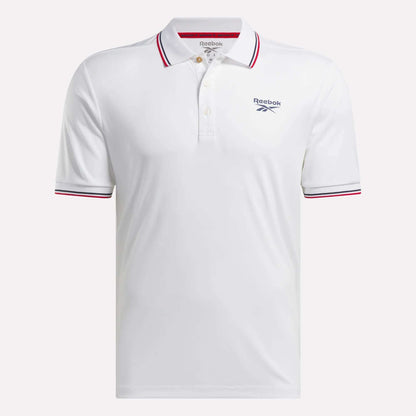 The Reebok Men's Country Club Oxford Pique Polo Shirt features short sleeves, a three-button placket, red and navy trim on the collar and sleeves, plus the Reebok logo on the left chest for classic golf style.