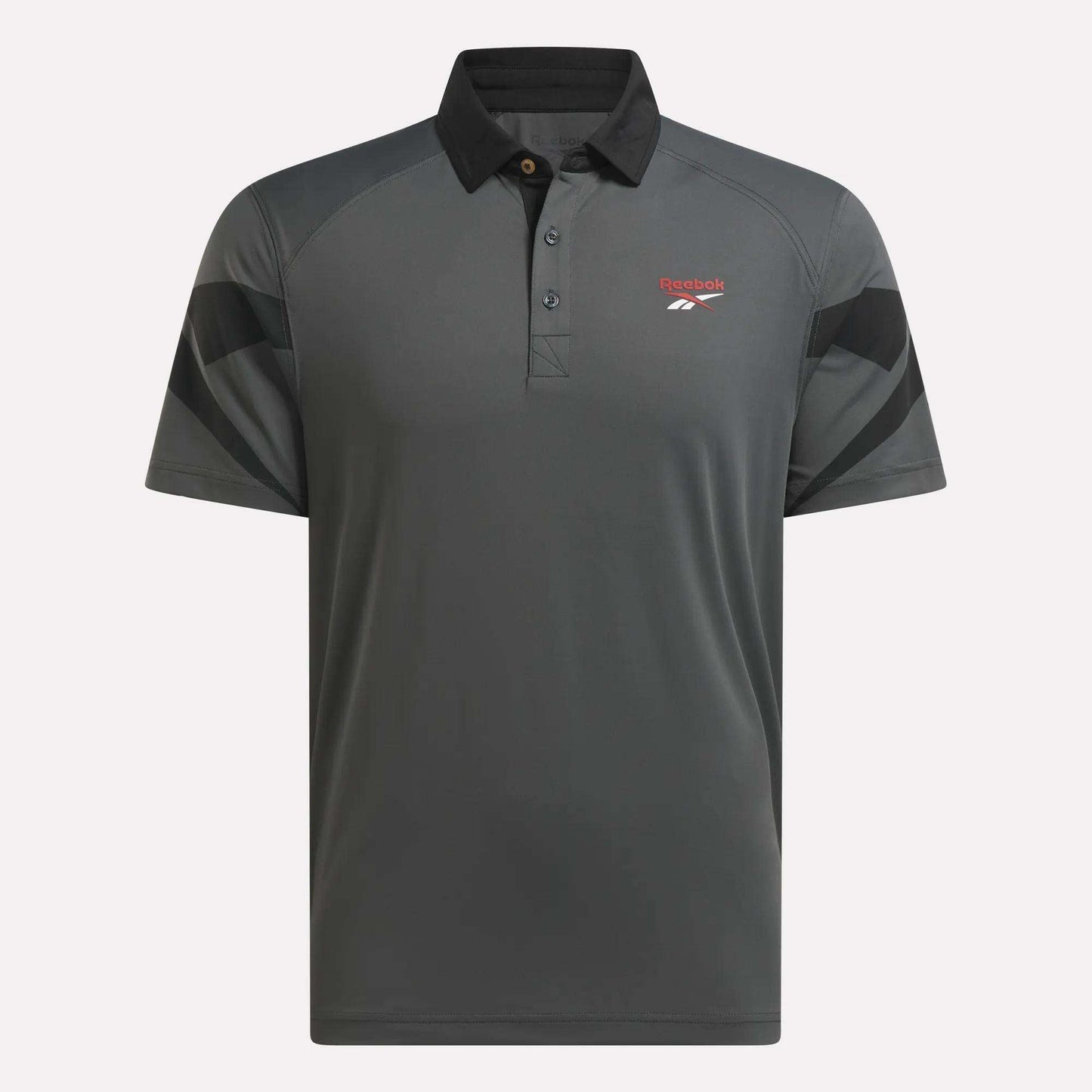 The Reebok Men's Signature Vector Colorblocked Polo Shirt is gray with short sleeves, a black collar, black shoulder accents, and a red logo on the chest. Crafted with RBK-DRY fabric for cool, comfortable wear on the golf course.