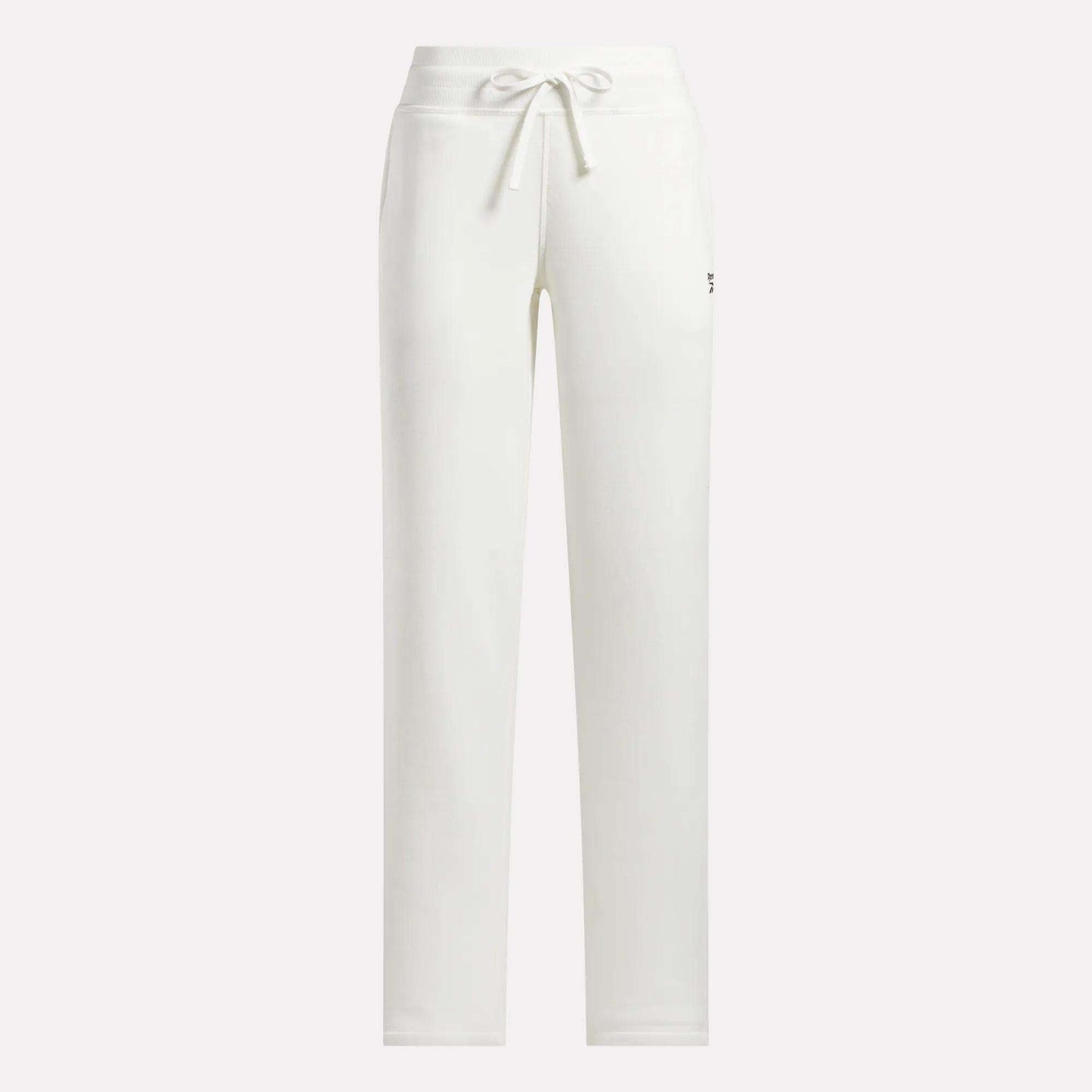 Reebok Women's Cozy Classic Sweatpants in white cotton blend featuring a drawstring waistband, straight-leg fit, and a small logo on the upper left thigh. Shown against a plain, light-colored background.
