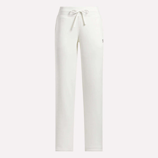 Reebok Women's Cozy Classic Sweatpants in white cotton blend featuring a drawstring waistband, straight-leg fit, and a small logo on the upper left thigh. Shown against a plain, light-colored background.