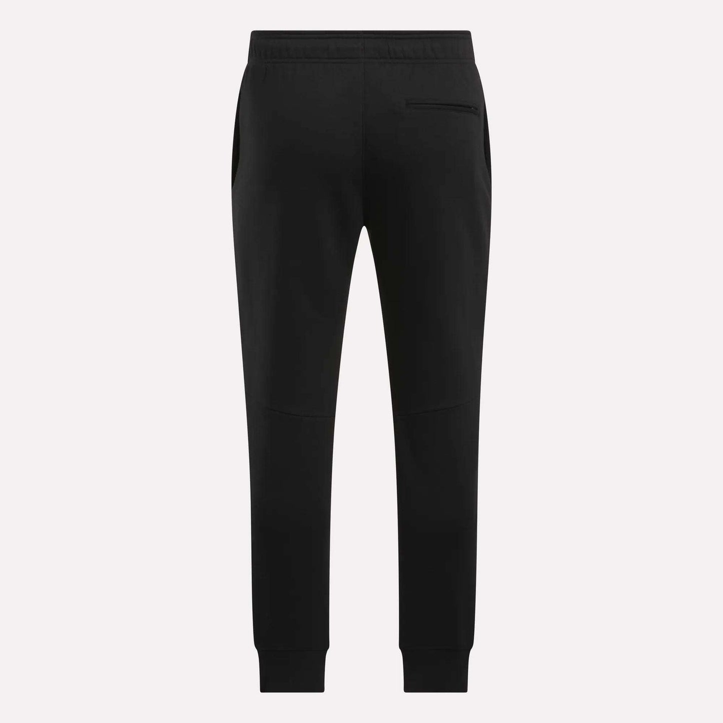 The Reebok Men's Motion Joggers in black slim fit are shown from the back, featuring an elastic waistband, side pockets, a single right back pocket, and tapered legs with ankle cuffs.