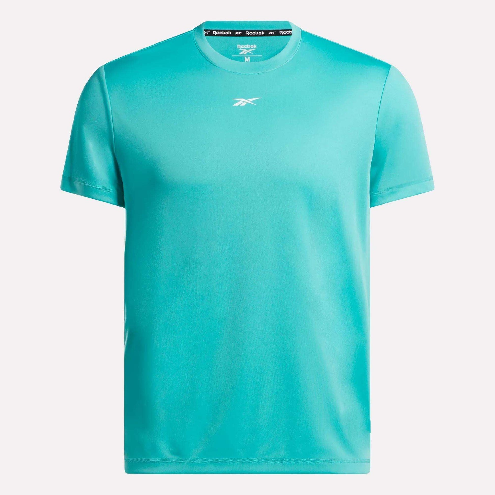 The Men's Short Sleeve Tech Training T-Shirt by Reebok is turquoise, features short sleeves, a small white Reebok logo on the chest, and sweat-wicking fabric. Displayed against a white background.