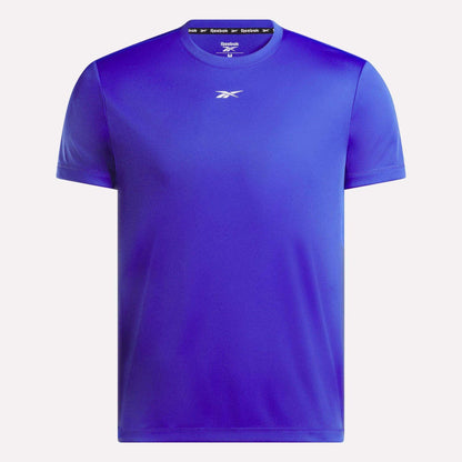 The Men's Short Sleeve Tech Training T-Shirt by Reebok is shown in royal blue with a classic crew neckline, sweat-wicking fabric, and the white Reebok logo at the chest, set against a white background.