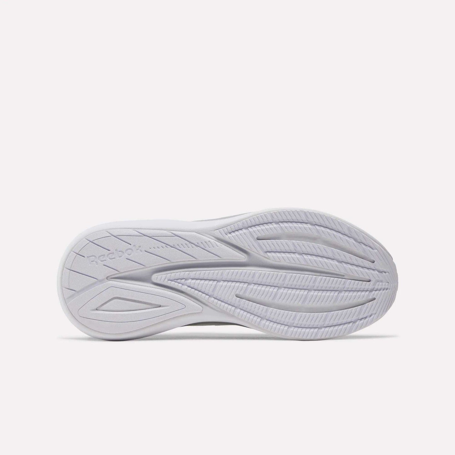 The image shows the bottom view of a white Women's Viva Speed Shoe sole by Reebok, featuring curved grooves and traction patterns, along with a cushioned midsole designed for all-day comfort and breathability.