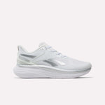 The Reebok Women's Viva Speed Shoes in White/White/Grey feature a thick, sculpted sole and a breathable mesh upper with subtle silver accents. Displayed against a plain light background, these athletic running shoes are the perfect choice for those seeking both style and comfort.
