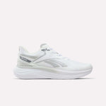 A white Men's Viva Speed Shoe by Reebok, featuring a breathable mesh upper, subtle gray logo accents, and a thick cushioned sole for all-day comfort—shown against a plain white background.
