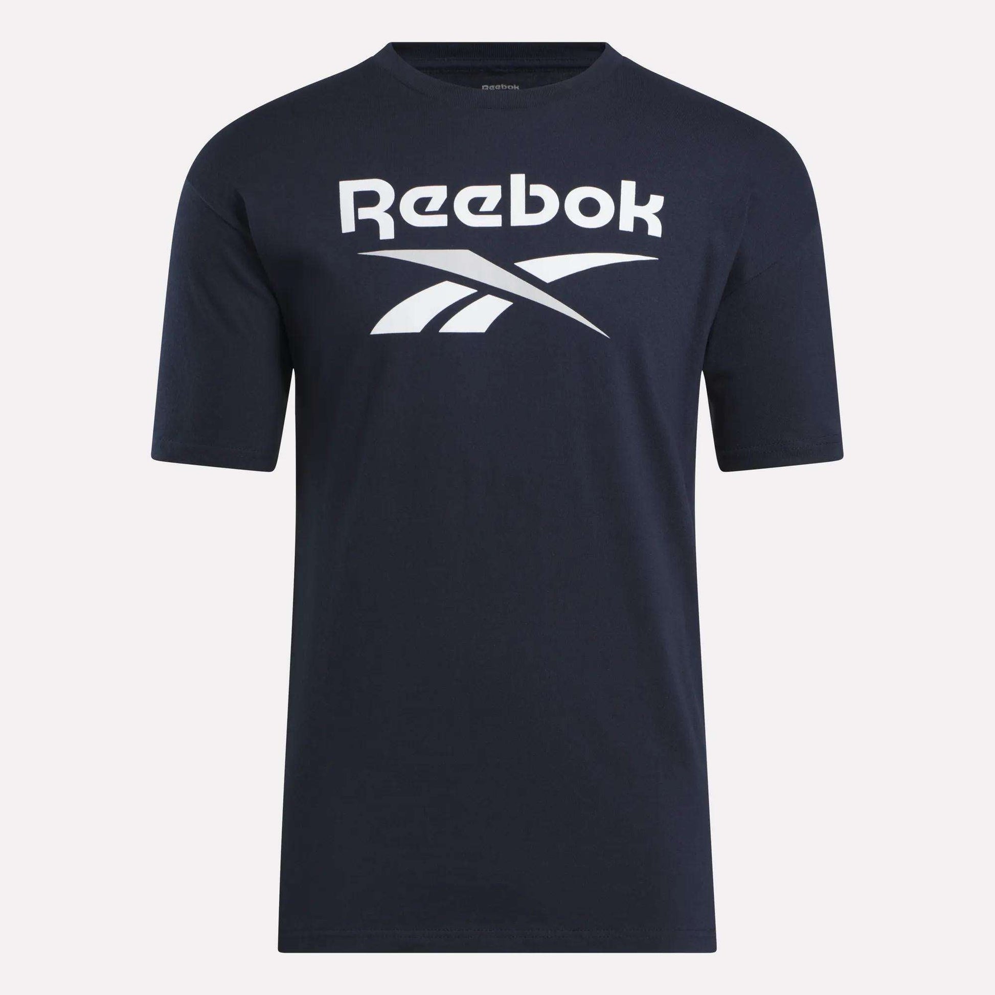 The Reebok Men's Stacked Vector T-Shirt is a navy blue cotton tee with short sleeves, featuring a bold white Reebok logo and text on the chest—ideal for everyday comfort.