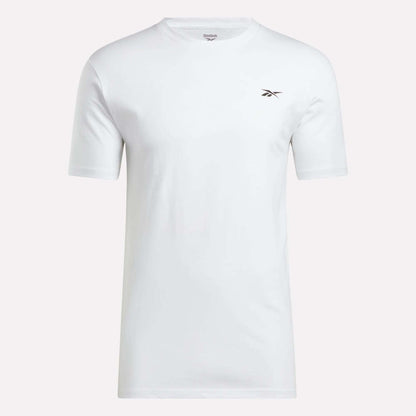 The Reebok Men's Identity Small Logo T-Shirt offers a relaxed fit and timeless style, featuring a plain white design with a small black and red Reebok logo on the left chest, displayed against a white background.