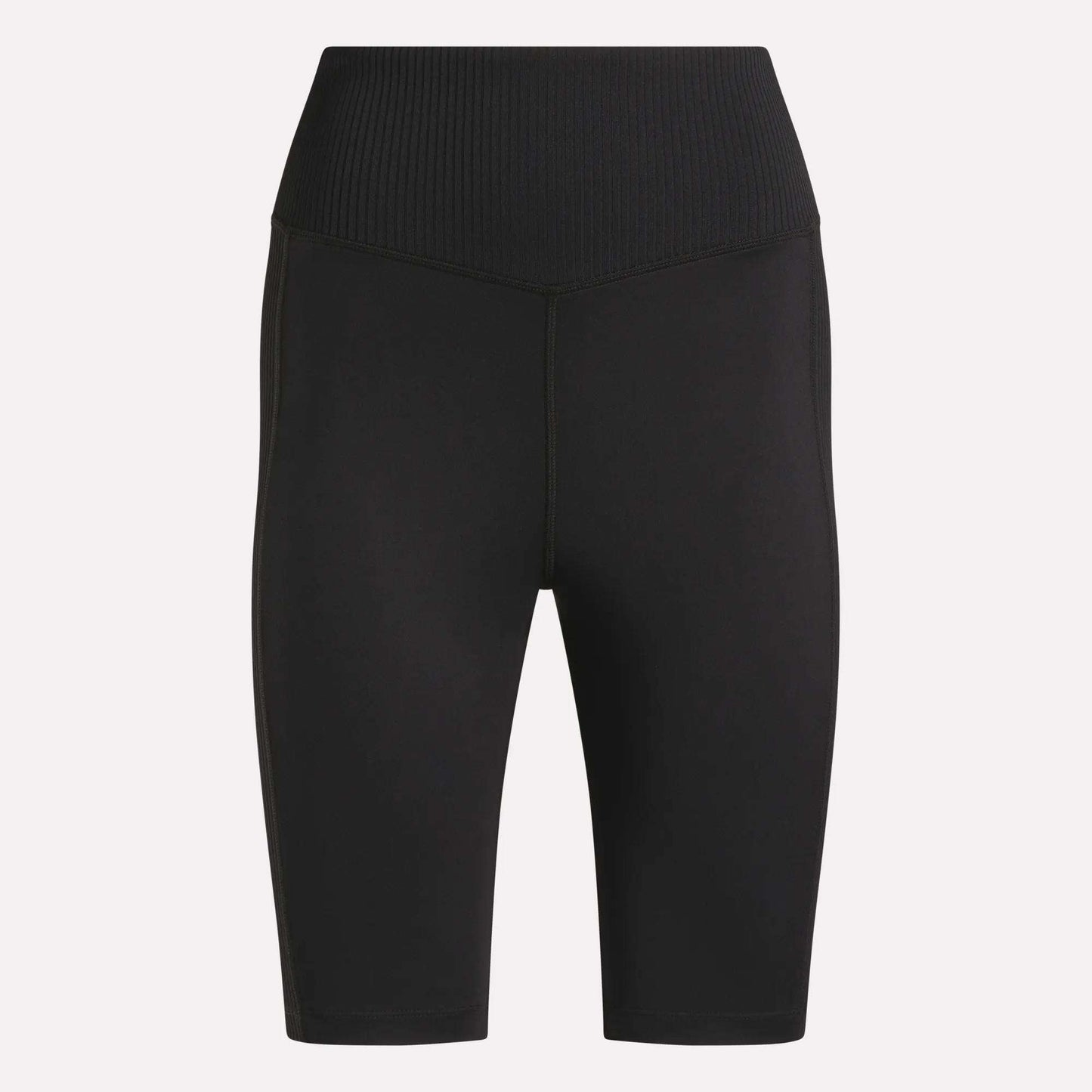 Reebok Women's Peached Biker Shorts 9" in black, featuring a high-rise ribbed waistband, seamless front, mid-thigh length, and soft peached fabric, shown on a plain light background.