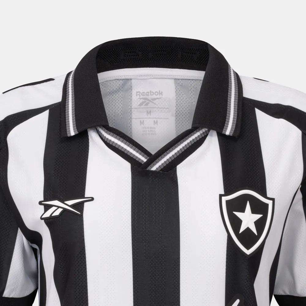 The Botafogo Women's Home Jersey by Reebok features classic black and white stripes, a black collar, Reebok logo on the right chest, and star shield badge on the left—perfect for the 25/26 football shirt collection.