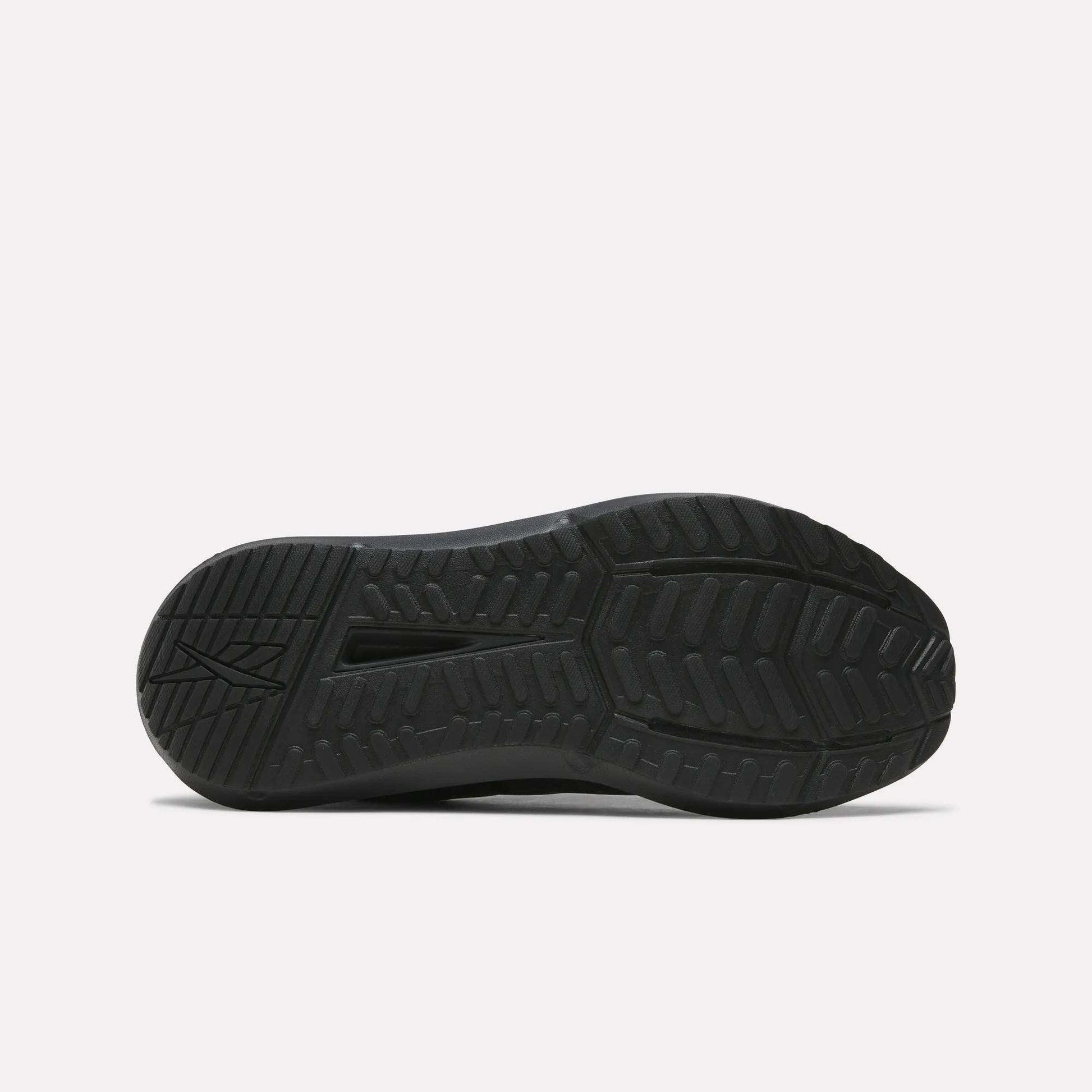 The outsole of the Reebok Men's Cityride 2 Running Shoes is shown from below, highlighting its patterned tread with multiple grooves and textures for traction and FuelFoam cushioning, set against a plain white background.