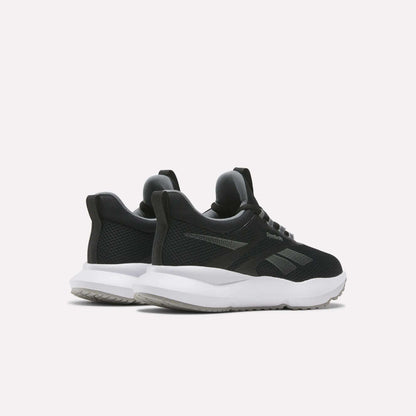 A pair of Reebok Women's Cityride 2 Running Shoes in black with white soles are angled to display the back and side views against a light background. They feature mesh uppers, subtle branding, and FuelFoam cushioning for comfort.