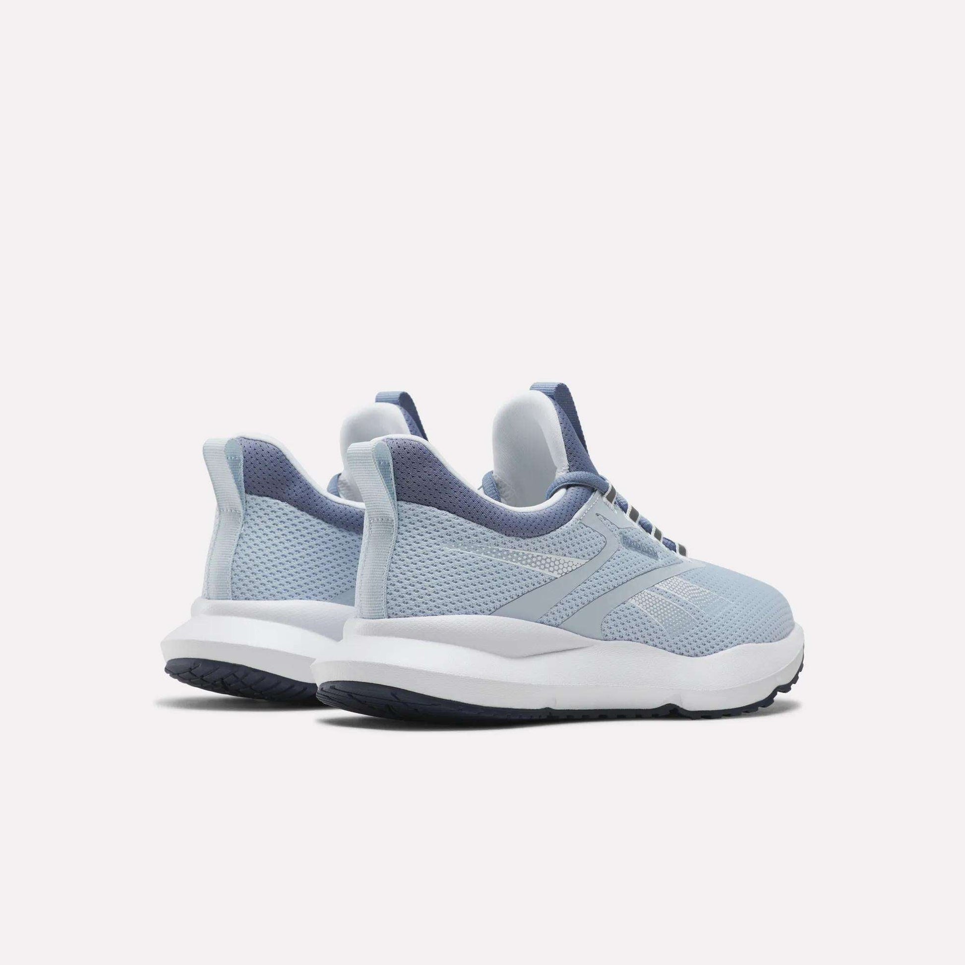 A pair of Reebok Women's Cityride 2 Running Shoes in light blue with FuelFoam cushioning, white soles, and navy accents, shown at a slight back and side angle against a plain white background.