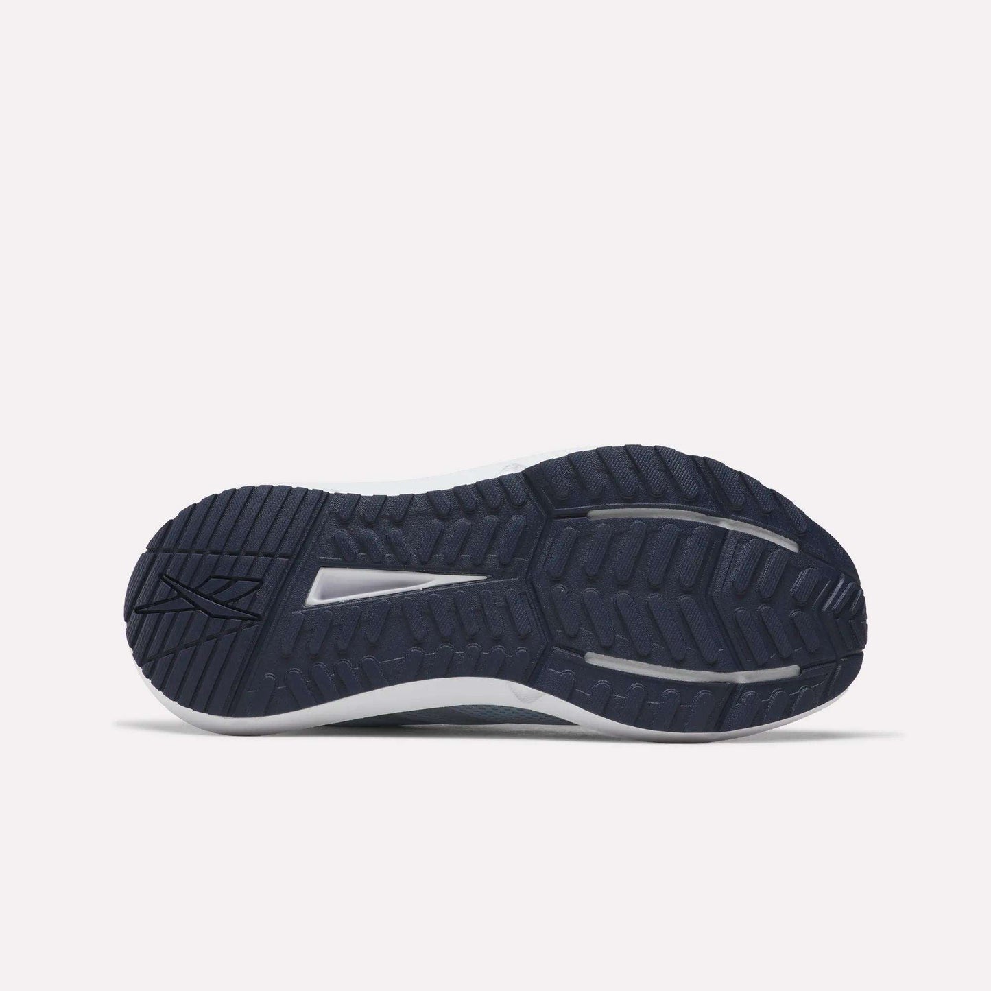 The image displays the dark blue, textured rubber outsole of Reebok Women's Cityride 2 Running Shoes, revealing multiple tread patterns and grooves as seen from the bottom against a plain light background.