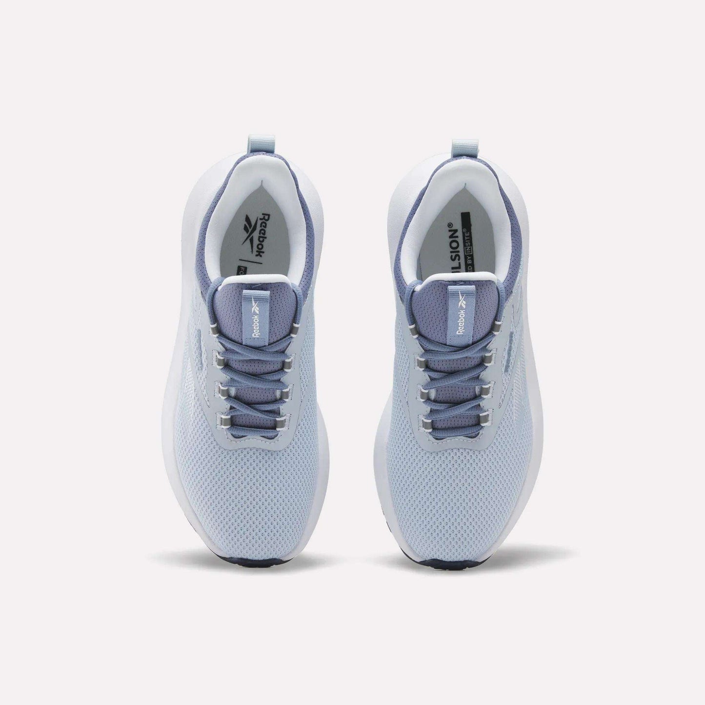 Top view of Reebok Women's Cityride 2 Running Shoes in light blue with white soles, grayish blue laces, and mesh uppers. The Reebok logo appears on the tongue and insoles. Features FuelFoam cushioning for all-day comfort.