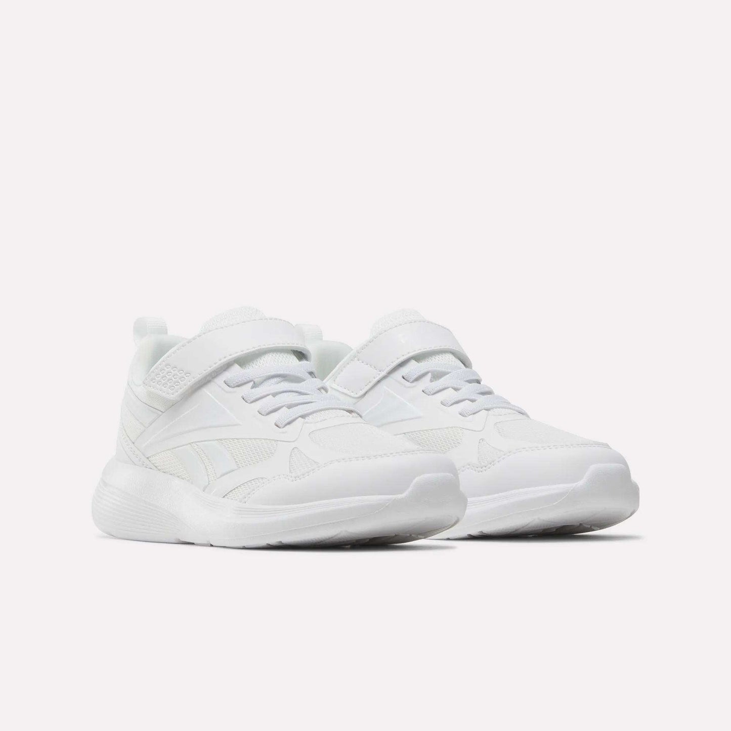 A pair of Reebok Rush Runner 6.0 Elastic Lace Top Strap Running Shoes for little kids, featuring mesh details and all-day comfort, displayed side by side on a plain white background.