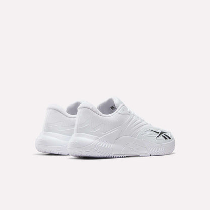 A pair of Reebok Phase EVO Tennis Shoes in white with textured soles and black side accents, shown on a plain white background. Both the outer and rear views of the sneakers are visible in the image.