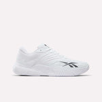 The Reebok Phase EVO Tennis Shoes feature a white mesh upper, textured sole, and black Reebok logo on the side—durable athletic sneakers ideal for tennis. Shown against a light plain background.