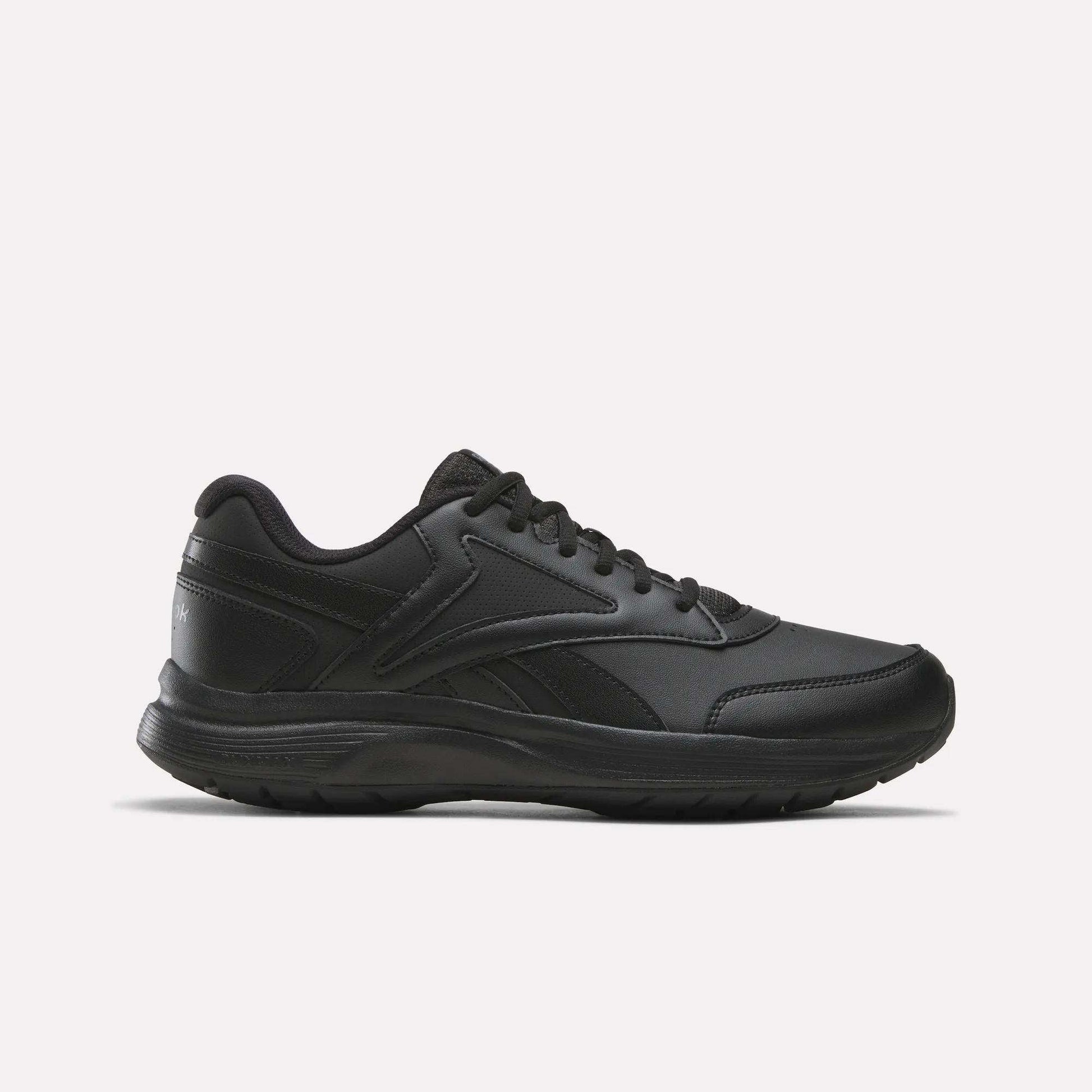 A black/Cold Grey 5/Collegiate Royal athletic sneaker with a lace-up design, visible stitching, and a textured sole—shown in a side profile view on a plain white background—this style exemplifies the Men's Walk Ultra 7 DMX Max Shoes by Reebok, featuring DMX cushioning for exceptional comfort during every step.