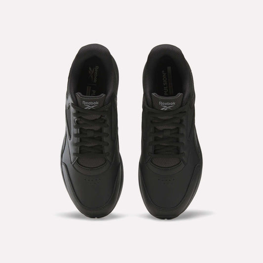 Top view of a pair of Reebok Men's Walk Ultra 7 DMX Max Shoes in black with matching black laces, displayed side by side on a white background. Equipped with DMX cushioning, these shoes offer enhanced comfort and stylish support for everyday walking.