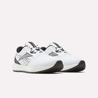 A pair of Reebok Men's Nanoflex 2 Training Shoes in white, highlighted by black accents, breathable mesh uppers, sturdy black soles, and a signature black Reebok logo on the sides—ideal for workouts—displayed against a light background.
