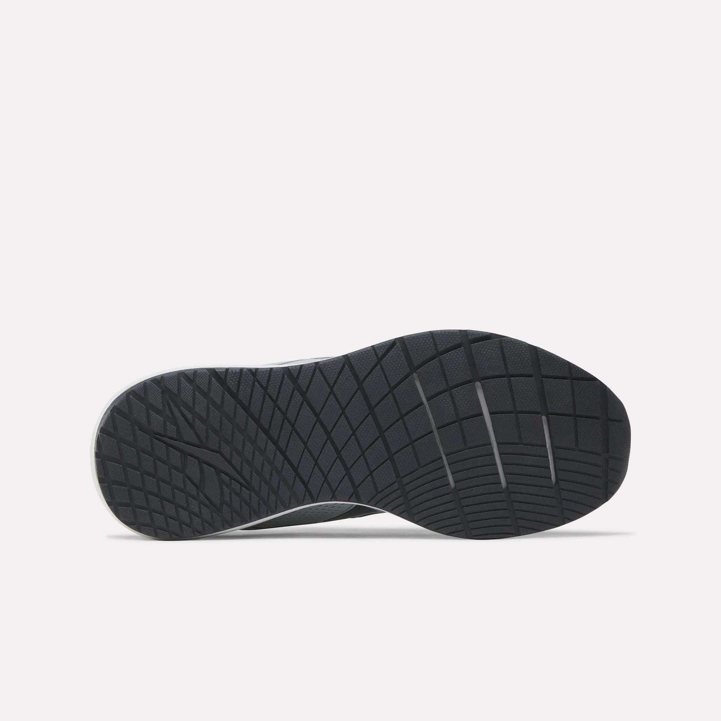 The image displays the black rubber sole of the Reebok Women's NFX Trainer 2 Training Shoes, featuring a diamond and grid tread pattern, as seen from the bottom against a plain white background.