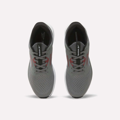 A pair of gray Reebok Men's Nanoflex 2 Training Shoes viewed from above, featuring black interiors, white soles, and red accents on the sides, with Reebok branding on the tongues. These athletic shoes are designed with breathable mesh for enhanced comfort during intense training sessions.