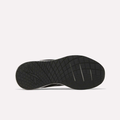 The sole of the Reebok Women's NFX Trainer 2 Training Shoes is shown from the bottom, displaying a textured pattern with geometric lines and grooves for enhanced traction against a plain white background.