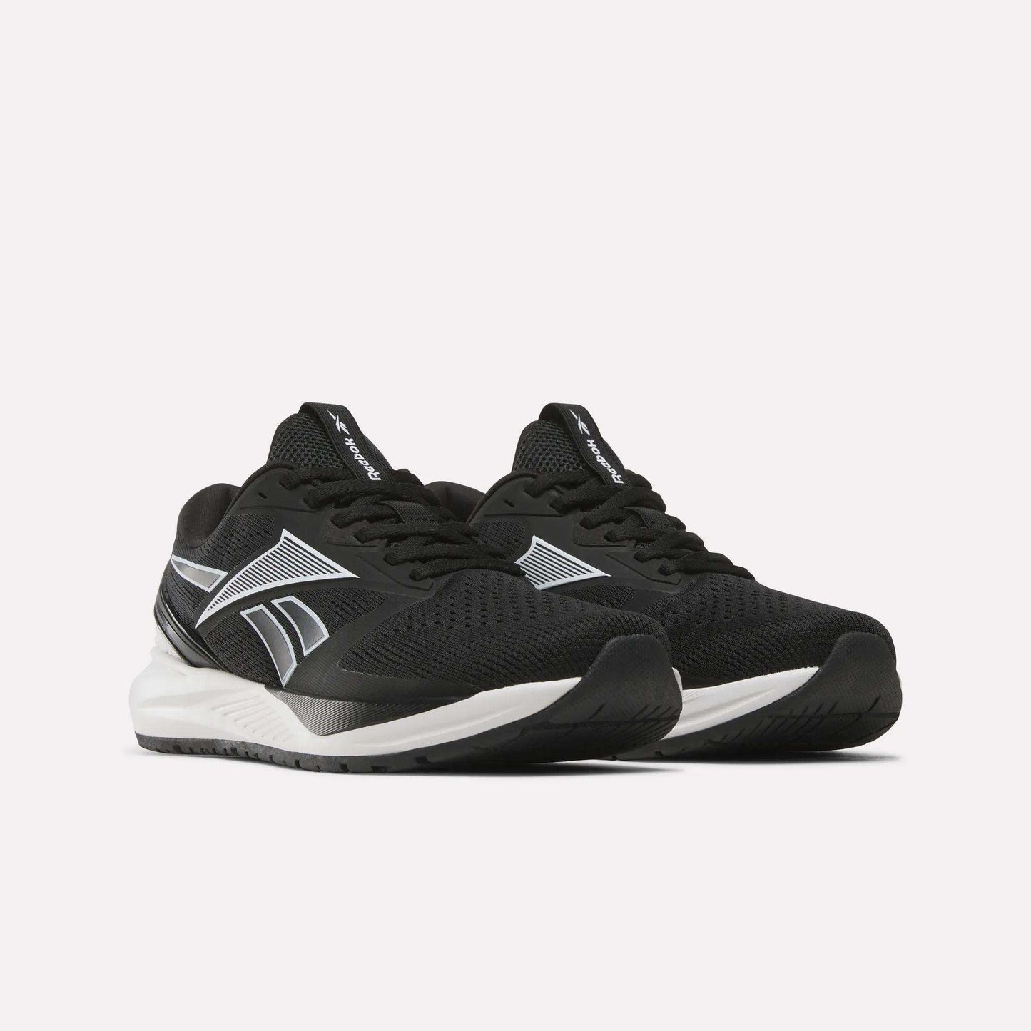 A pair of Reebok Women's NFX Trainer 2 Training Shoes in black with white soles and silver accents, displayed on a plain white background.