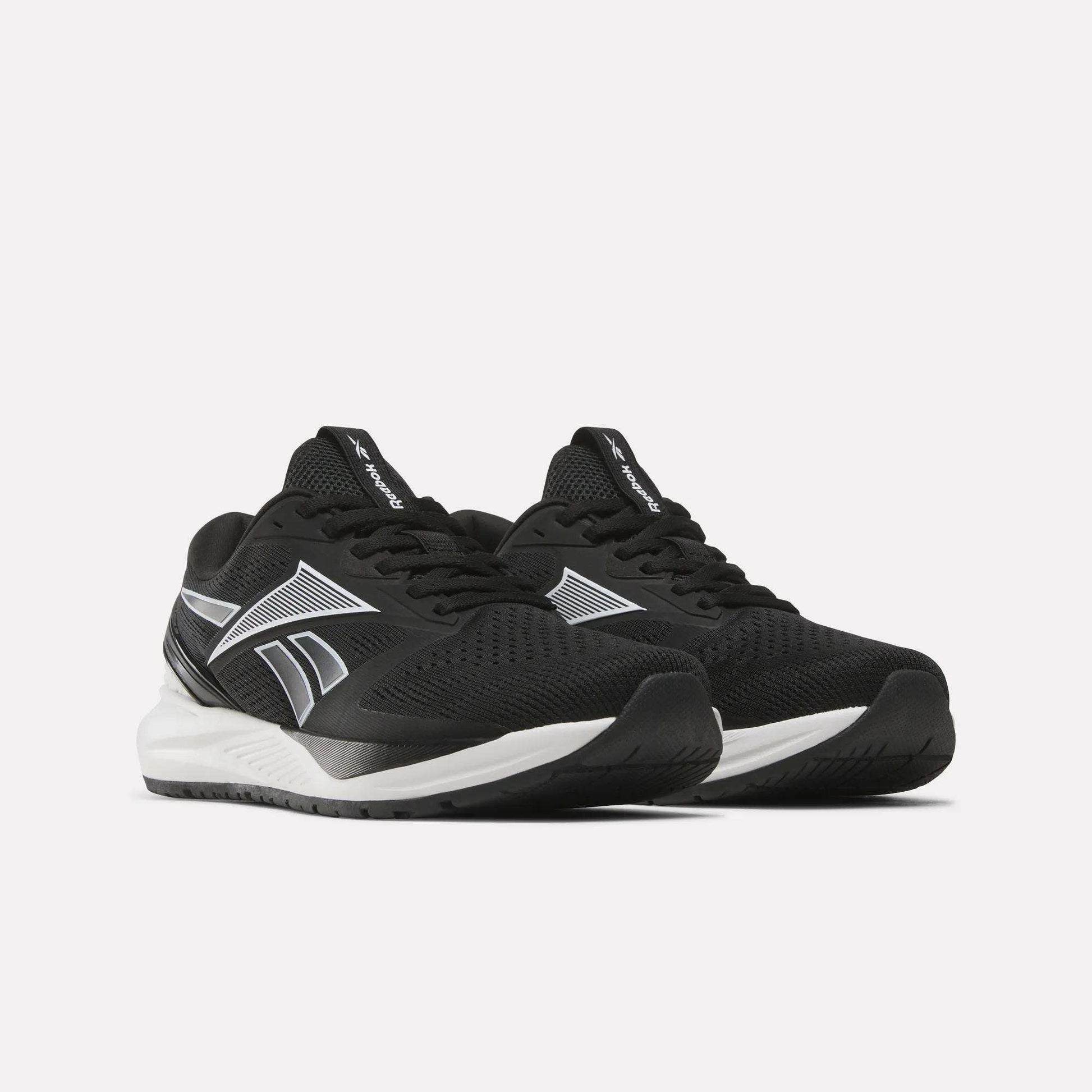 A pair of Reebok Women's NFX Trainer 2 Training Shoes in black with white soles and silver accents, displayed on a plain white background.