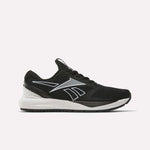The Women's NFX Trainer 2 Training Shoes by Reebok are black athletic sneakers with white and gray accents, featuring a mesh upper and a white midsole. Designed as versatile workout shoes, they showcase a sleek silhouette with a prominent Reebok logo on the side and are displayed against a plain white background.