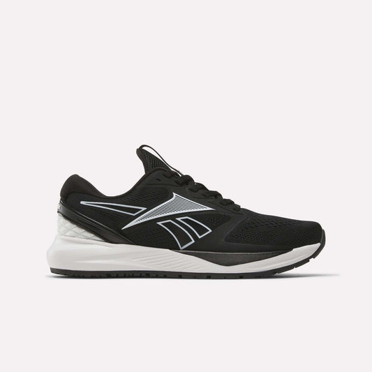 The Women's NFX Trainer 2 Training Shoes by Reebok are black athletic sneakers with white and gray accents, featuring a mesh upper and a white midsole. Designed as versatile workout shoes, they showcase a sleek silhouette with a prominent Reebok logo on the side and are displayed against a plain white background.