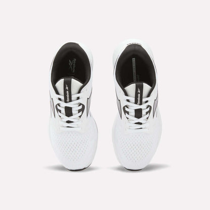 A pair of Reebok Women's Nanoflex 2.0 Training Shoes in white with black accents is shown from above, displaying the laces and mesh toe area. The shoes are placed side by side on a plain light background.