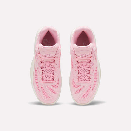 The Reebok Engine A 26 Basketball Shoes are shown from above in pink with mesh, wavy overlays, and white soles. Pink laces match the energetic vibe of these stable sneakers, designed for basketball performance on a white background.