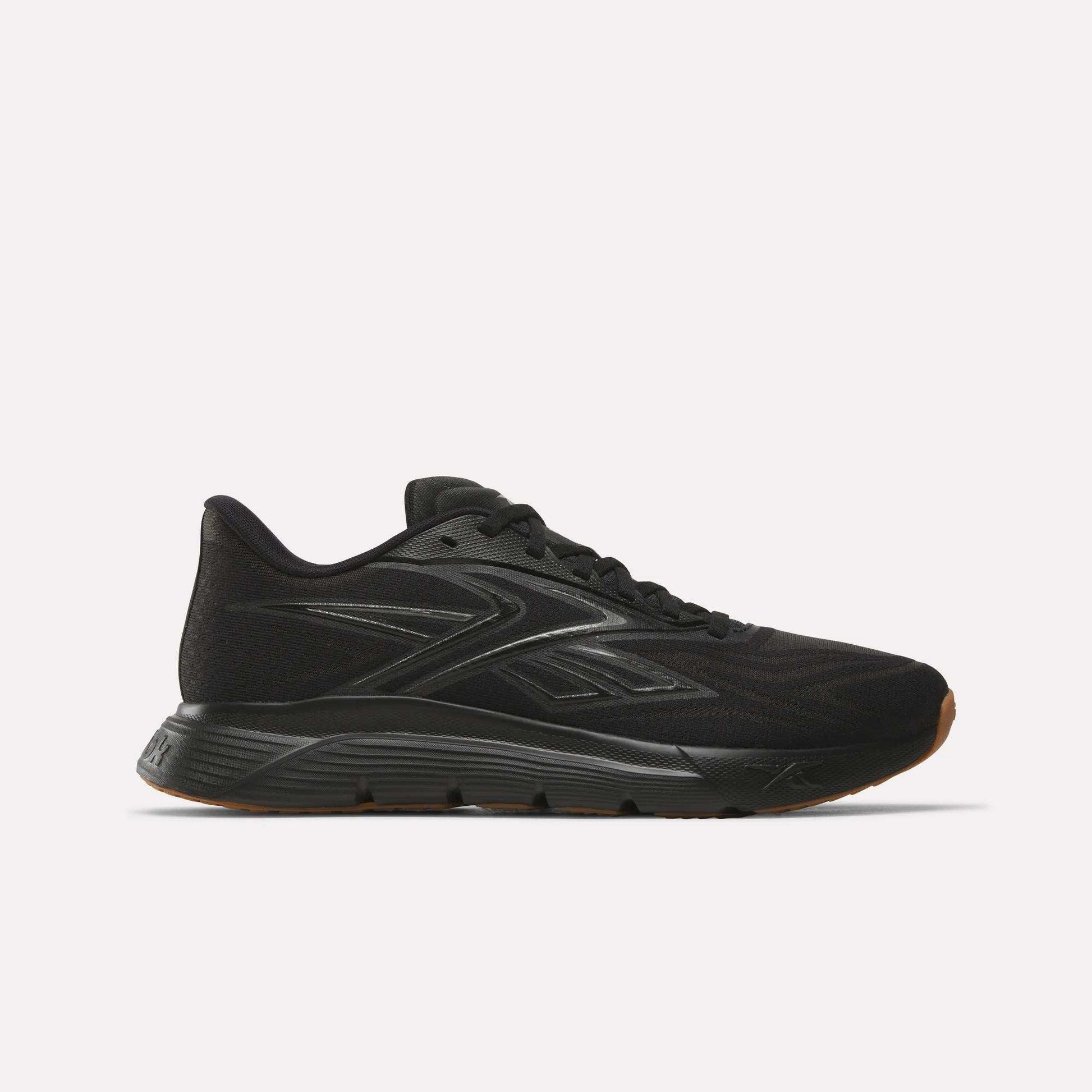 The Reebok Nano Gym 2.0 Training Shoes in Black/Gum feature a low profile, lace-up design, high-rebound foam sole, and subtle side logo, shown against a white background.