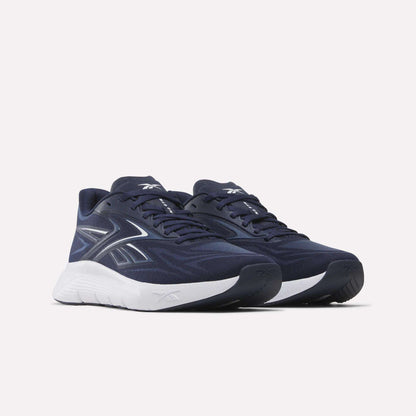 Step into the gym in style with Reebok Nano Gym 2.0 Training Shoes—navy blue with white soles and white/silver side logos—set against a plain light background, perfect for all your workouts.