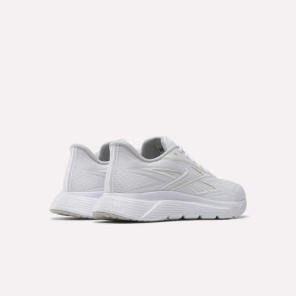 A pair of Reebok Women's Nano Gym 2.0 Training Shoes in white, featuring subtle textured patterns and a grey interior, displayed side by side on a light background from back and side views—ideal for your next workout.