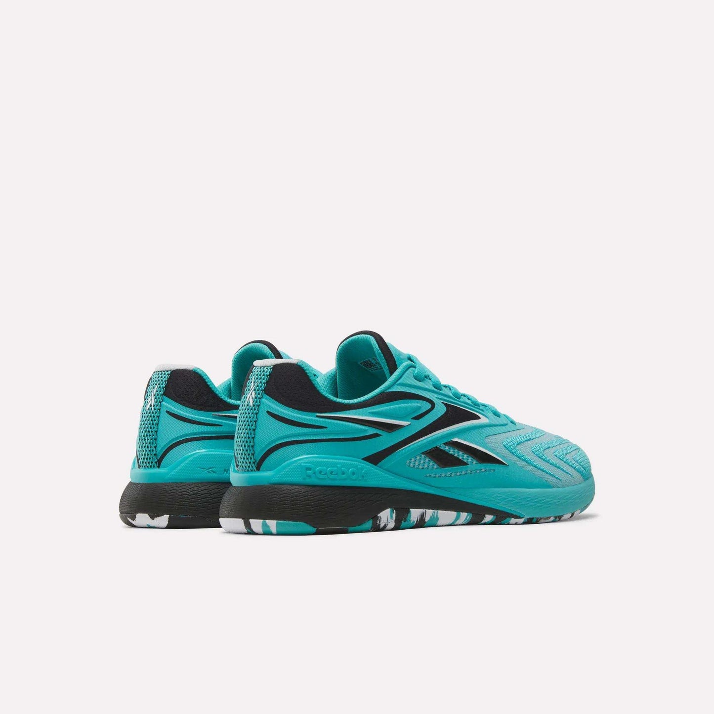 A pair of Reebok Women's Nano X5 Edge Training Shoes in turquoise with black accents, black midsoles, and patterned outsoles, perfect for HIIT classes, shown on a plain white background.