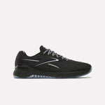 The Reebok Nano X5 Edge Training Shoes feature a black low-top design, white and gray accents, patterned laces, a white sole with a transparent section, the Reebok logo on the heel, and deliver top performance for training.