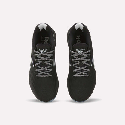 Top view of Reebok Nano X5 Edge Training Shoes—black with white accents and patterned laces—side by side on a light background, built for peak performance.
