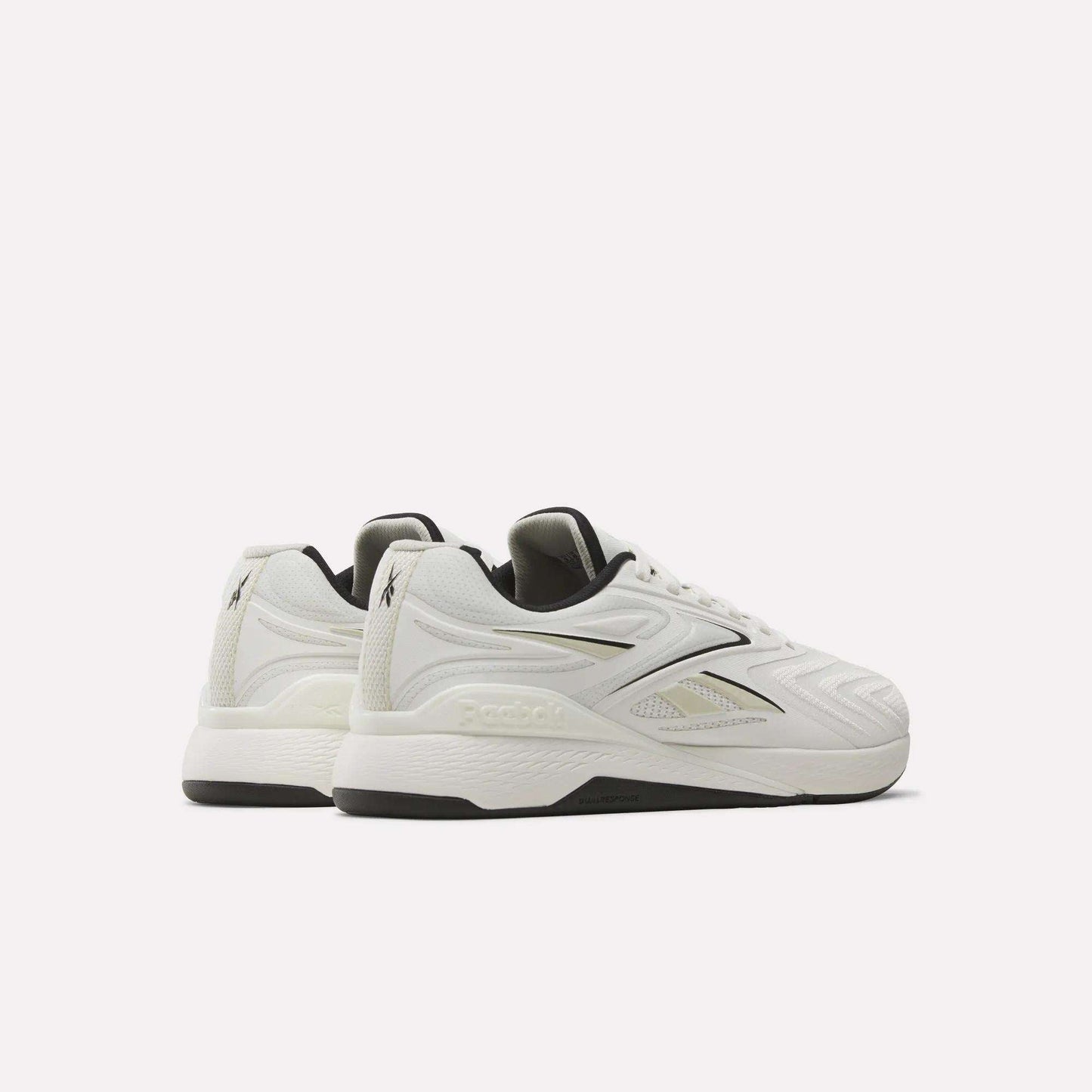 Reebok Nano X5 Edge Training Shoes in white with black soles and black/grey accents, displayed from back and side angles on a plain white background—perfect for top performance.