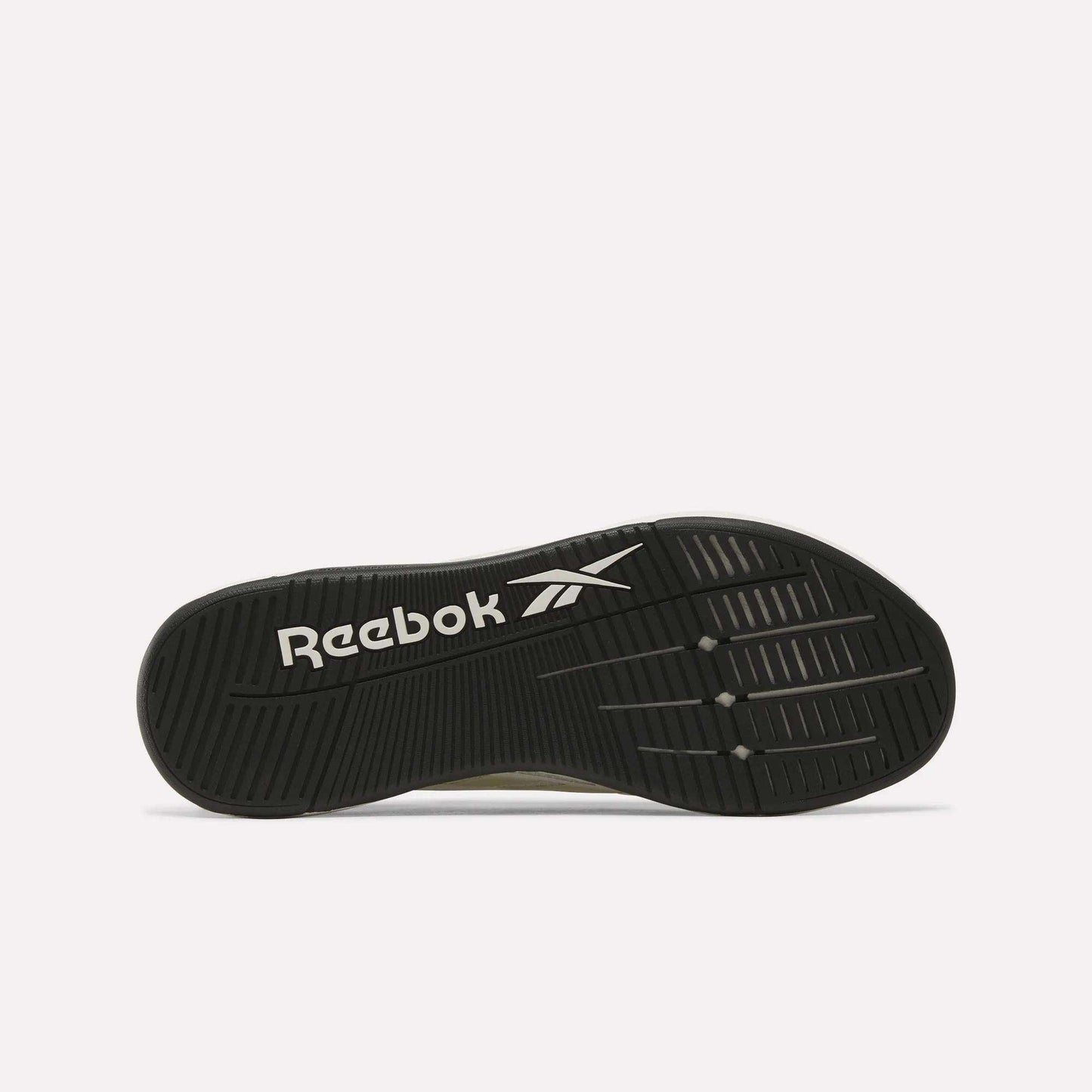 The image displays the black rubber sole of the Reebok Nano X5 Edge Training Shoes, featuring a white Reebok logo and vector symbol. The textured pattern on the sole is designed to enhance grip, support, and performance.