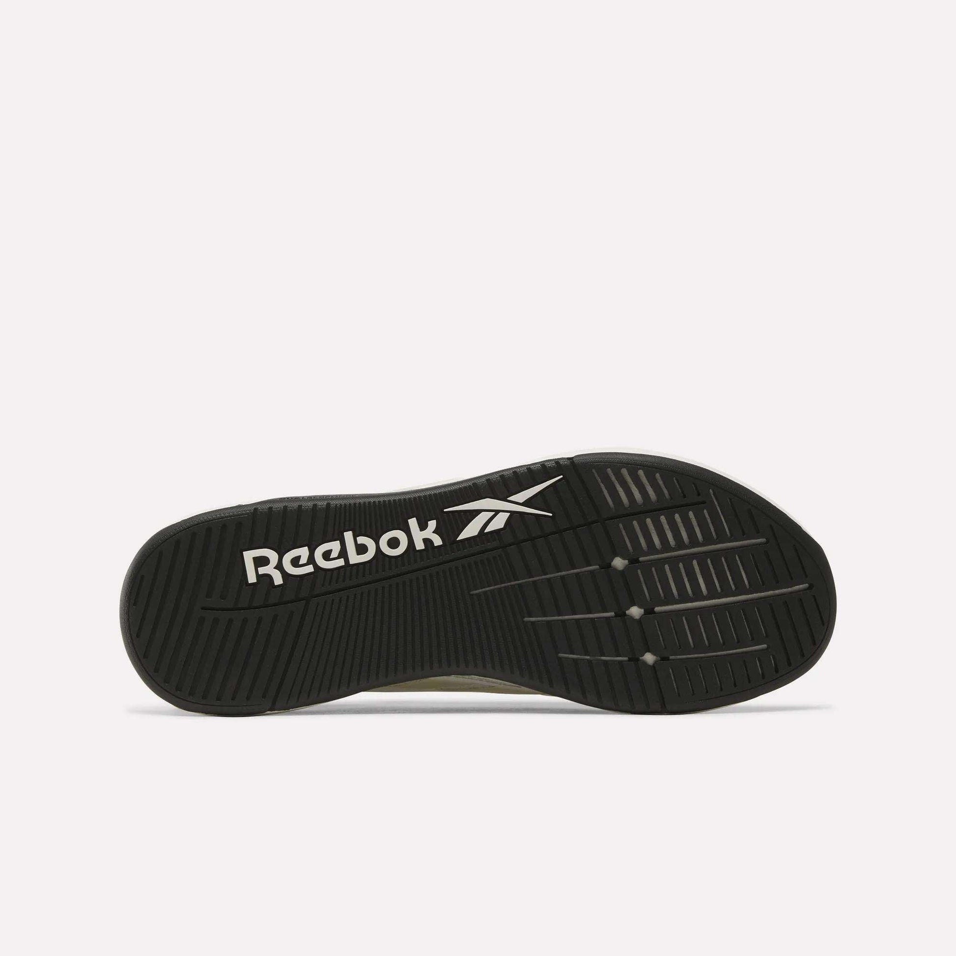 The image displays the black rubber sole of the Reebok Nano X5 Edge Training Shoes, featuring a white Reebok logo and vector symbol. The textured pattern on the sole is designed to enhance grip, support, and performance.