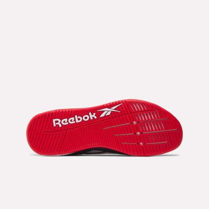 The image shows the red outsole of the Reebok Nano X5 Edge Training Shoes with a white Reebok logo. The Flexweave sole features textured grooves and horizontal lines, designed for enhanced traction during training.