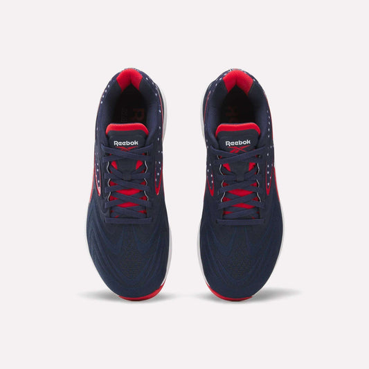 Top view of a pair of Reebok Nano X5 Edge Training Shoes in navy blue with red accents on the collar, sole, and lace holes, side by side on a white background.